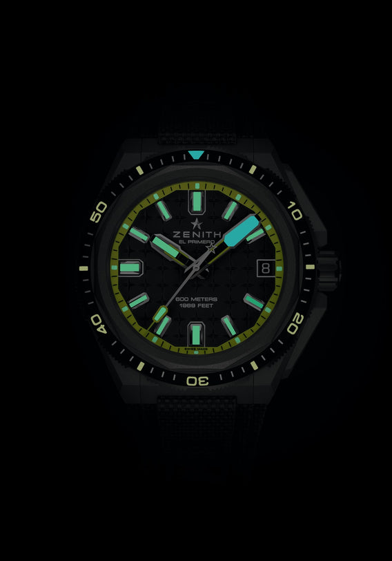 The Zenith Defy Extreme Diver displays 10:10, featuring glowing green and blue hour markers and hands.