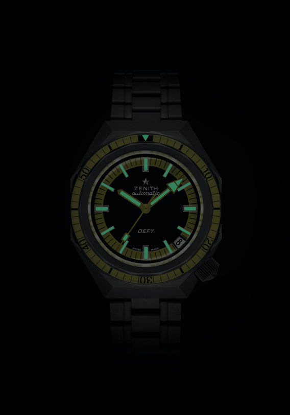 The Zenith Defy Revival wristwatch features glowing blue and green markers and hands, ensuring visibility even in the dark.