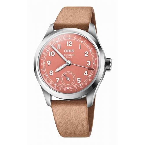 The Oris Big Crown Pointer Date Calibre 403 features a pink dial with Arabic numerals, a silver case, and a tan leather strap.