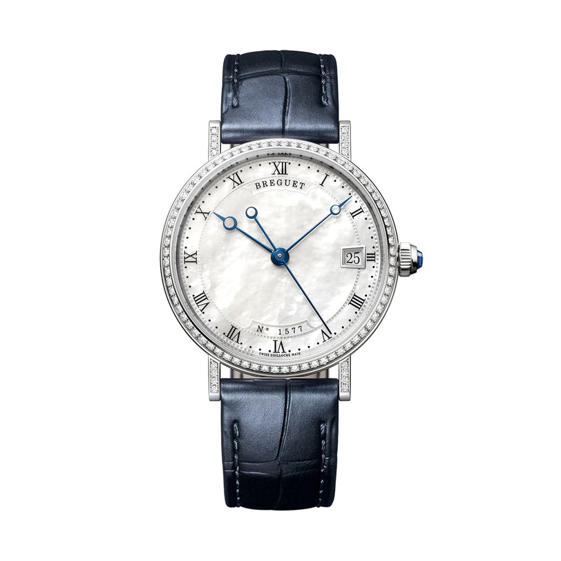 The Breguet Classique 9068 is a luxury white gold wristwatch with a white mother-of-pearl dial, Roman numerals, blue hands, date display, diamond bezel, and a black leather strap.