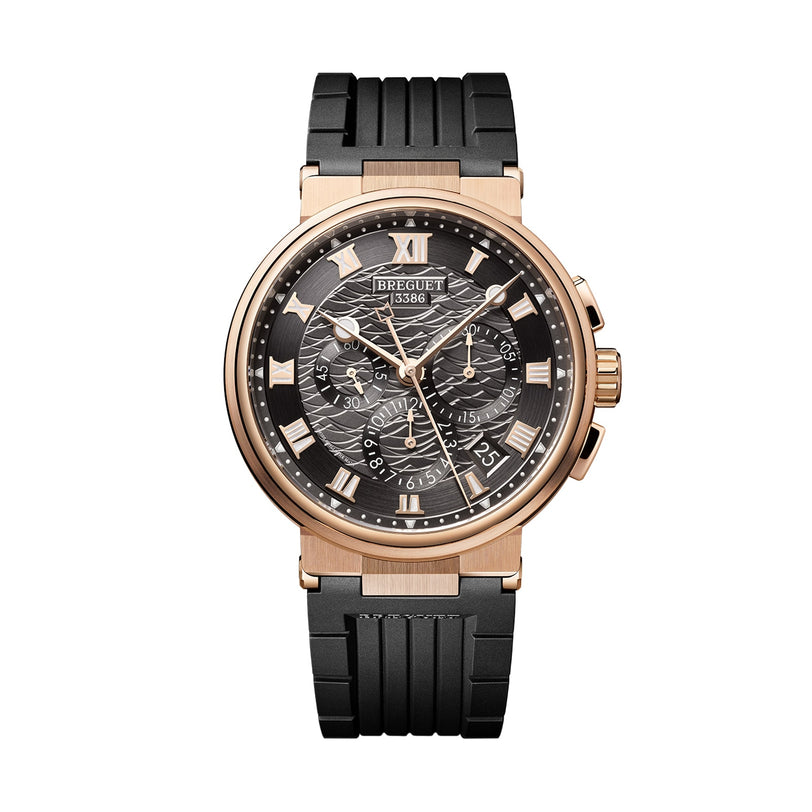 The Breguet Marine Chronographe 5527 features a black and gold case, black rubber strap, Roman numerals, and multiple subdials—an ideal sporty timepiece from this renowned chronometer brand.