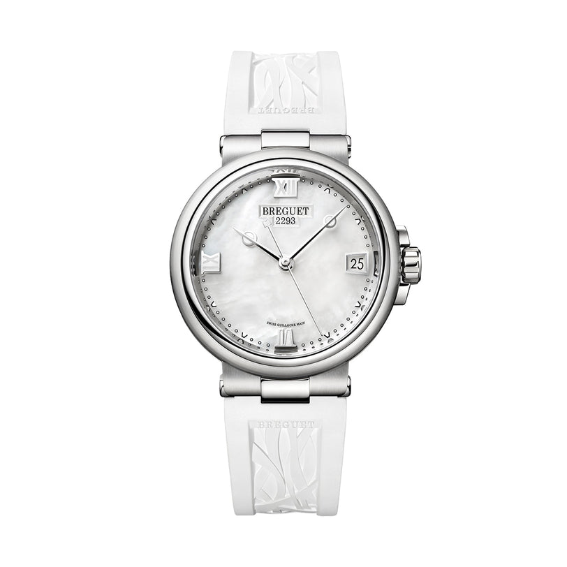 The Breguet Marine 9517 features a silver case, white mother-of-pearl dial with Roman numerals, date at 3 o’clock, and a white patterned strap—showcasing the brand’s signature marine elegance.