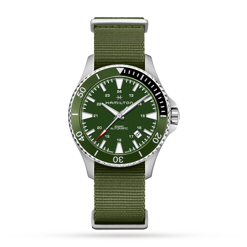The Hamilton Khaki Navy Scuba Auto wristwatch features Swiss-made movement, a green NATO strap, silver bezel, and white markers for a nautical look on a white background.