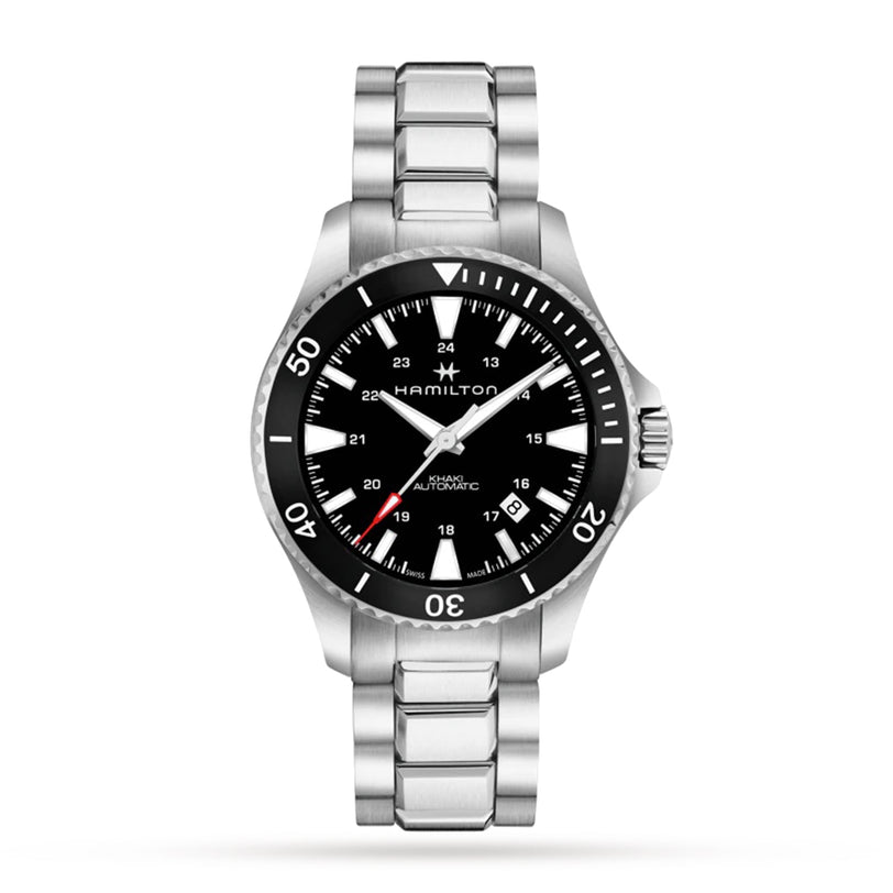 The Hamilton Khaki Navy Scuba Auto wristwatch features a stainless steel case, black dial with white markers, date window, and silver link bracelet, highlighting precision and style against a white background.