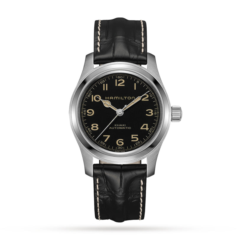 The Hamilton Khaki Field Murph Auto features a black dial with Arabic numerals, a silver case, and a black leather strap—an iconic collector’s watch inspired by Interstellar, shown here against a white background.