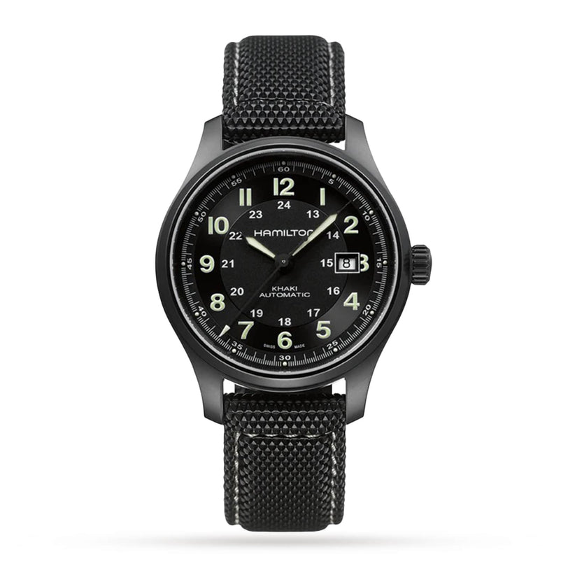 The Hamilton Khaki Field Titanium Auto mens watch features a black textured strap, luminous hands, Arabic numerals, and a date display at 3 o’clock.