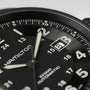 Close-up of a Hamilton Khaki Field Titanium Auto watch set to 2:00, featuring a date window with the number 3—a sleek men’s timepiece designed for both performance and style.