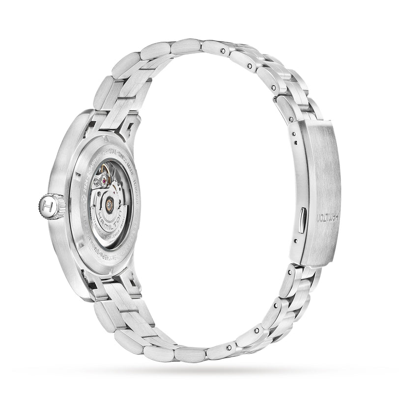 Side view of the Hamilton Khaki Field Auto wristwatch featuring a stainless steel case, transparent case back revealing the H-10 automatic movement with 80-hour power reserve, and a metal bracelet.