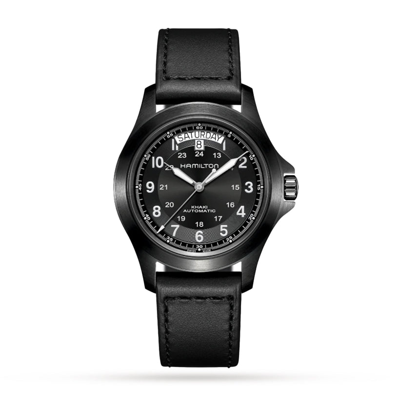 The Hamilton Khaki Field King Auto wristwatch features a black dial with white numerals and hands, day-date display, and a black leather strap—reflecting the brands iconic military-inspired field watch design.