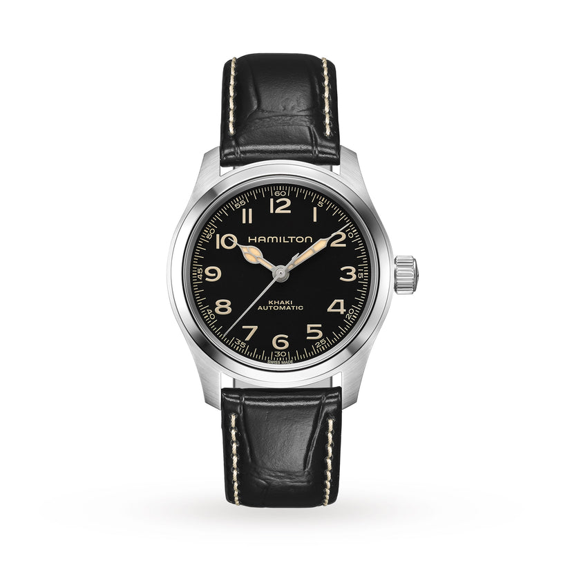 The Hamilton Khaki Field Murph 38mm wristwatch features a black dial, silver case, Arabic numerals, and a black leather strap with white stitching. It has automatic movement and is shown against a white background.