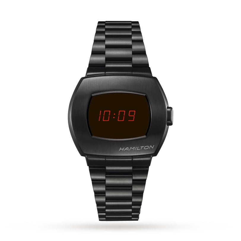 The Hamilton American Classic PSR Digital Quartz wristwatch features a black metal case, a rectangular face showing 10:09 in red on its hybrid LCD and OLED display, with the Hamilton brand name visible on the case.