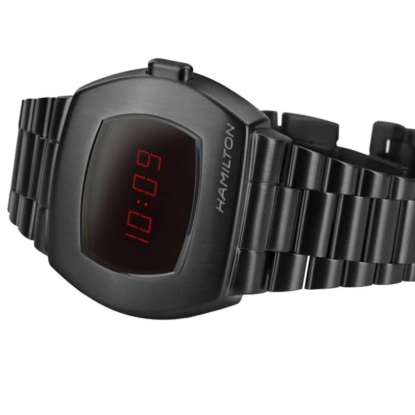 The Hamilton American Classic PSR Digital Quartz watch features a black metal bracelet, red LED hybrid LCD/OLED display showing 10:09, and a sleek design.