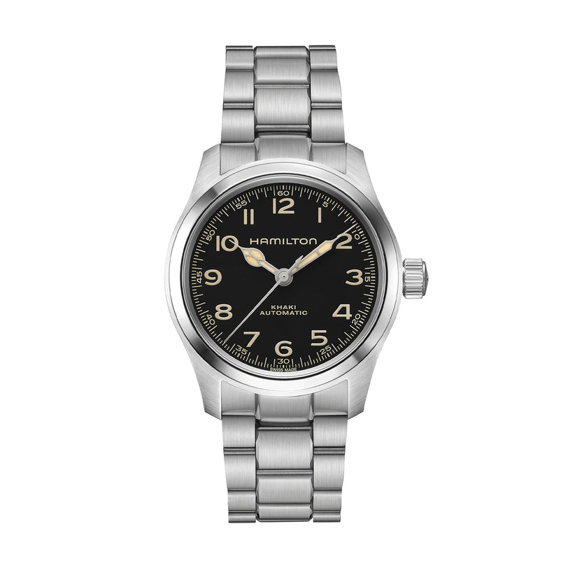The Hamilton Khaki Field Murph 38mm features a black dial with Arabic numerals, silver hands, and a stainless steel bracelet, offering classic vintage style.