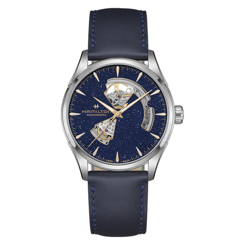 The Hamilton Jazzmaster Open Heart Auto 42mm features a partially open silver case, blue starry dial, gold hour markers, and a sleek blue leather strap—an automatic dress watch that stands out for its unique design.