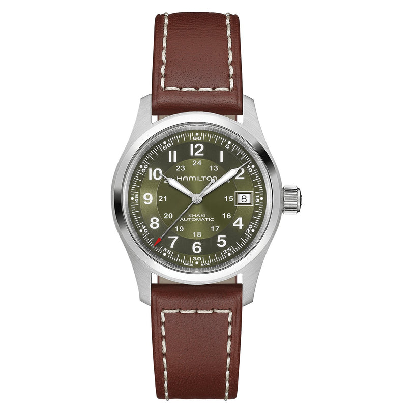 The Hamilton Khaki Field Auto 38mm features a green dial with white numerals, date window at 3 o’clock, silver case, and brown leather strap with white stitching, showcasing classic military style and an automatic movement.