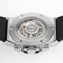 Close-up of the back of a Hublot Classic Fusion Chronograph Titanium watch, revealing its mechanical movement through a transparent case back.
