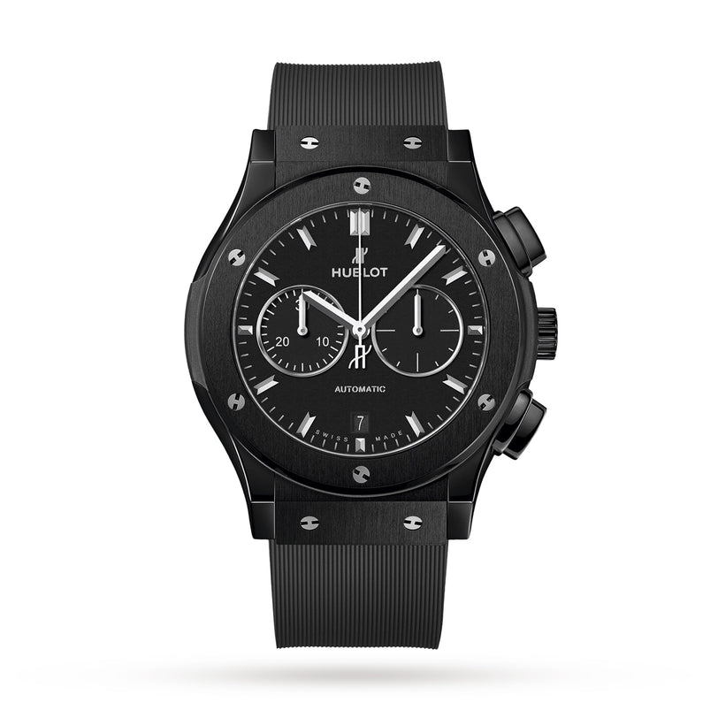 The Hublot Classic Fusion Chronograph Black Magic features a black ceramic case, black dial with chronograph sub-dials, date at 6 o’clock, and a black rubber strap.