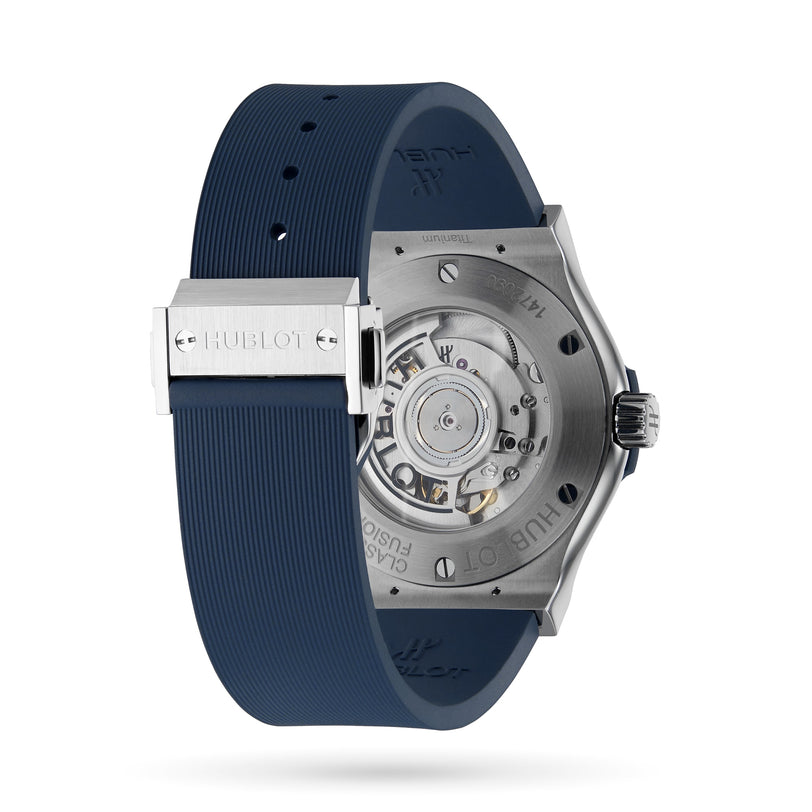 Back view of the Hublot Classic Fusion Titanium Blue watch featuring a blue rubber strap and a visible mechanical movement through its transparent case back.
