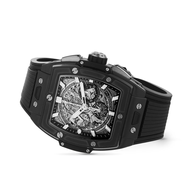 The Hublot Spirit Of Big Bang Black Magic features a skeleton dial with visible gears, a rectangular ceramic case, and a black rubber strap—capturing bold luxury in the iconic Big Bang style.