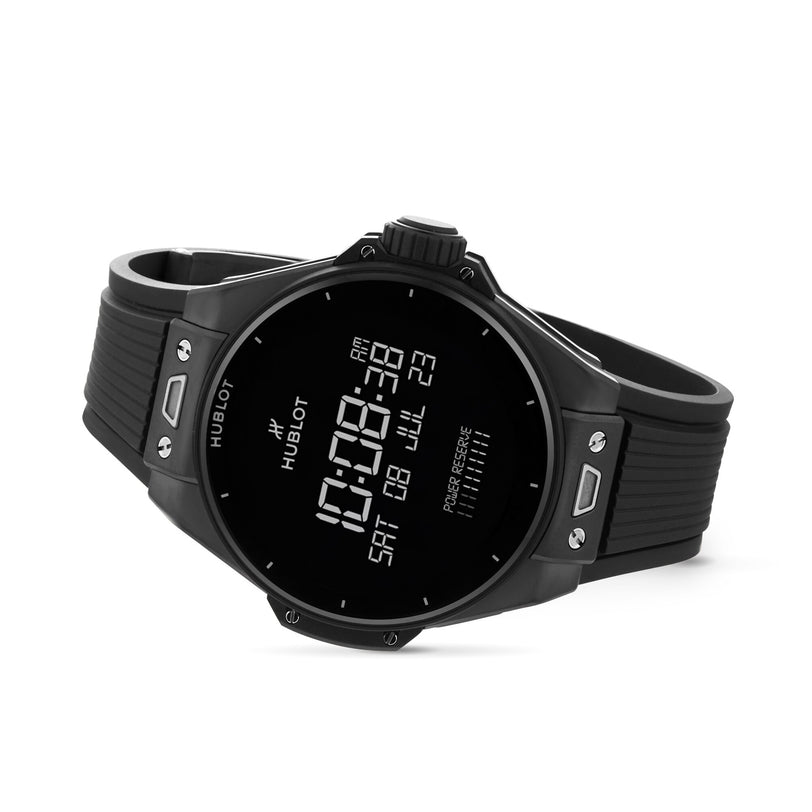 The Hublot Big Bang E Gen3 Black Magic is a black digital wristwatch that displays time, date, day, and battery level on its screen.