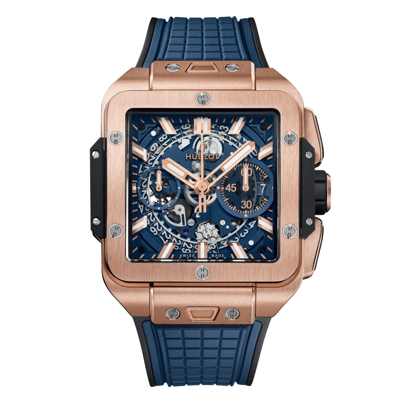 The Hublot Square Bang Unico King Gold Blue features a rose gold case, blue skeleton dial with gold indices, blue rubber strap, visible chronograph subdials, and flyback chronograph function.