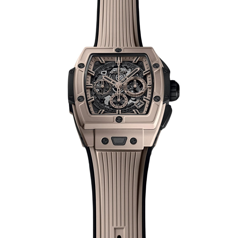 The Hublot Spirit of Big Bang Beige Ceramic is a beige and black square-faced wristwatch featuring a skeleton dial, chronograph functions, ribbed silicone strap, and a HUB4700 caliber with silicon regulating element.