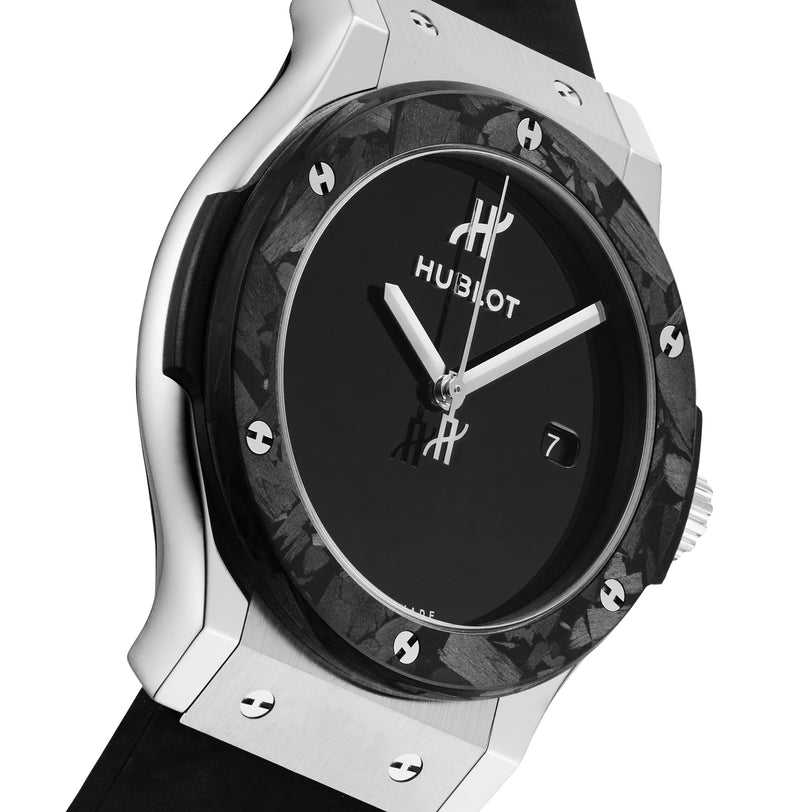 A black and silver Hublot Classic Fusion Centenary Special Edition wristwatch with a black dial, date window, and black strap; Watches of Switzerland Group Exclusive.