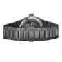 The Girard-Perregaux Laureato Skeleton is shown from the back, highlighting its stainless steel case, octagonal bezel, transparent case back, and visible skeletonized mechanical movement inside.