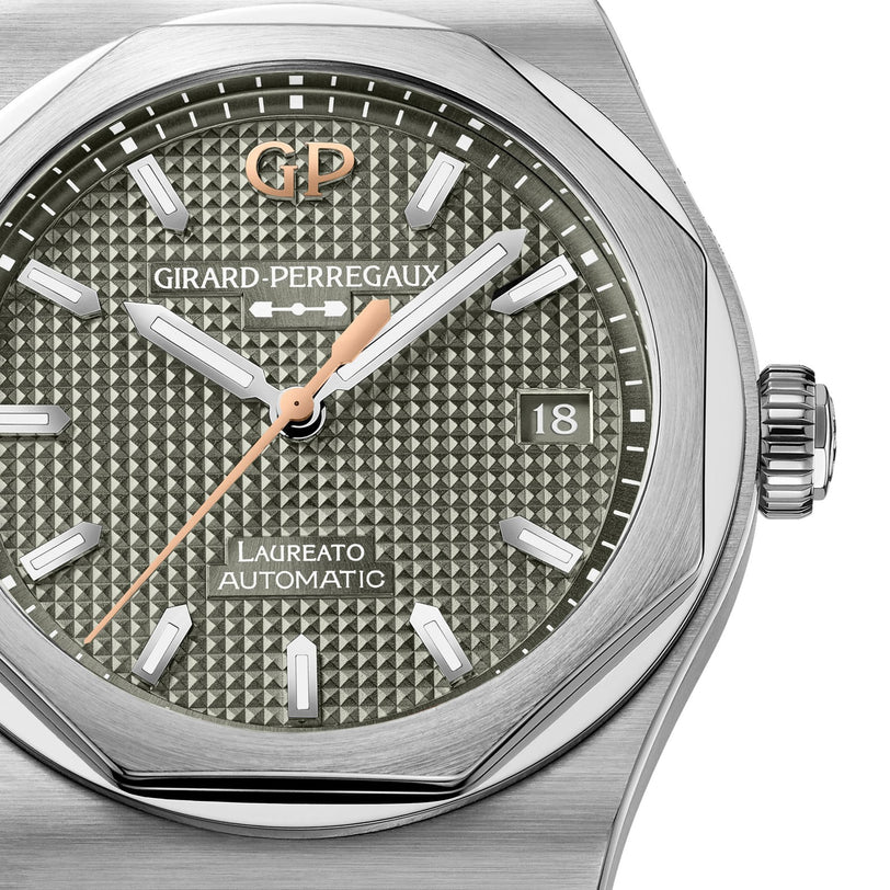Close-up of the Girard-Perregaux Laureato 38 watch featuring a textured gray dial and a date window at 3 oclock.