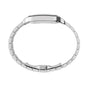 Side view of the Santos de Cartier by Cartier, a silver metal wristwatch with a linked bracelet and clasp, highlighting its slim profile, minimalist design inspired by aviation heritage, and self-winding mechanical movement on a white background.