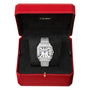 A Santos de Cartier wristwatch by Cartier with a white dial and self-winding mechanical movement is shown in an open red Cartier box lined with black fabric.