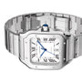The Cartier Santos de Cartier is a stainless steel wristwatch featuring Roman numerals, blue hands, a date window at 3 o’clock, a blue cabochon crown, and a self-winding mechanical movement.