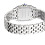 Close-up of the Panthère de Cartier watch by Cartier, showing its stainless steel band, engraved caseback, and blue gemstone set in the crown.