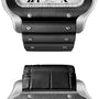 Close-up of a Santos de Cartier Chronograph case by Cartier, showing a black rubber strap above and a black leather strap below, each attached with visible screws.