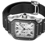 The Santos de Cartier Chronograph by Cartier features a square silver dial, black bezel, chronograph subdials, Roman numerals, and a black rubber strap with metal studs and buckle—highlighting the elegance of the brand.