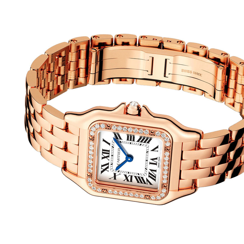 The Panthère de Cartier by Cartier features a rose gold case, diamond-set bezel, white square dial with Roman numerals and blue hands, and is finished with a sleek metal link bracelet.
