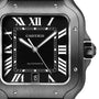 Close-up of the Cartier Santos de Cartier watch face with Roman numerals, sword-shaped hands, date window at 6 oclock, brushed stainless steel case, and QuickSwitch interchangeability system.