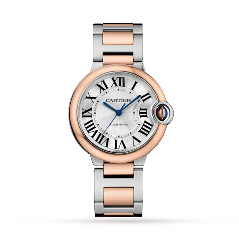 The Ballon Bleu de Cartier by Cartier features a round two-tone case with rose gold accents, Roman numeral hour markers, blue hands, and a two-tone metal bracelet.