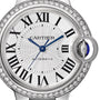 Close-up of the Ballon Bleu de Cartier by Cartier, with Roman numerals, blue hands, a diamond-set bezel, and a polished steel case.