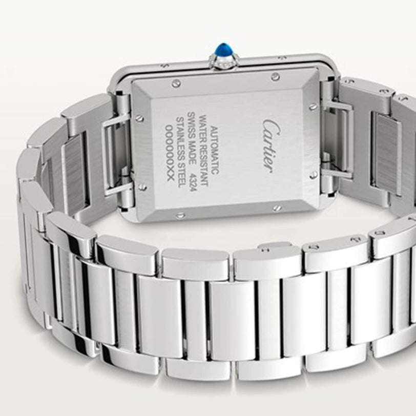 Back view of the Cartier Tank Américaine in stainless steel, displaying its mechanical movement, water resistance, serial number, and iconic blue cabochon crown.