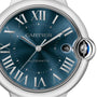 Close-up of the Ballon Bleu de Cartier by Cartier, featuring an automatic movement, blue sunray dial with Roman numerals, date at 3 o’clock, silver case with blue cabochon crown, and a sleek steel bracelet.