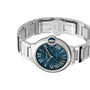 The Ballon Bleu de Cartier watch by Cartier features a stainless steel case, blue dial with Roman numerals, automatic movement, and a sapphire crown, displayed against a white background.