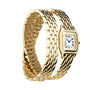 The Panthère de Cartier by Cartier showcases a square white dial with Roman numerals, blue hands, and a sapphire crown, finished with a wide yellow gold linked bracelet against a white background.