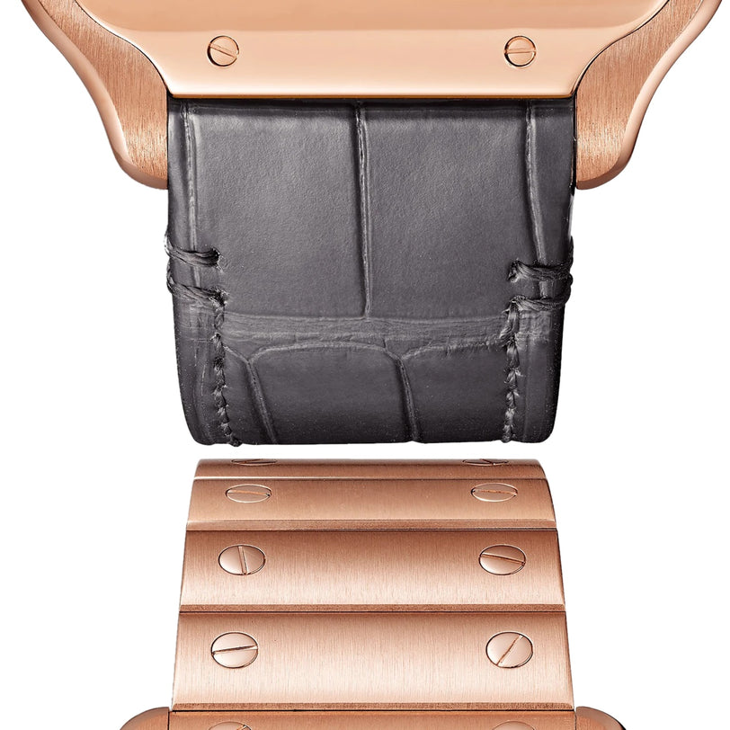 Close-up of a Cartier Santos de Cartier Skeleton watch band, showcasing the transition from black leather strap to rose gold bracelet with visible screws and SmartLink adjustment system.