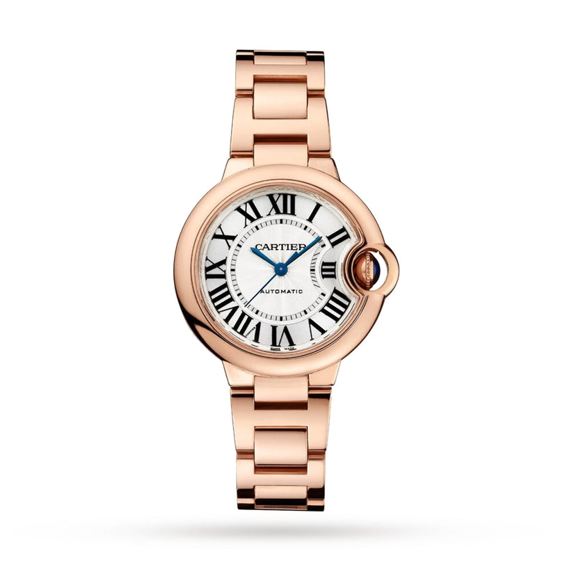 The Cartier Ballon Bleu de Cartier is a rose gold watch with a round white dial, Roman numerals, blue hands, cabochon sapphire crown, and matching link bracelet.