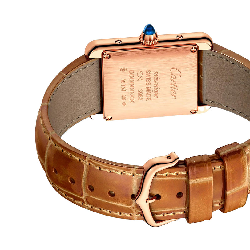Close-up of the back of a Cartier Tank Louis Cartier watch featuring an alligator skin strap, rose gold case, engraved details, and a blue gemstone on the crown.