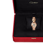 A gold La Panthère de Cartier watch by Cartier in a red and black Cartier box.
