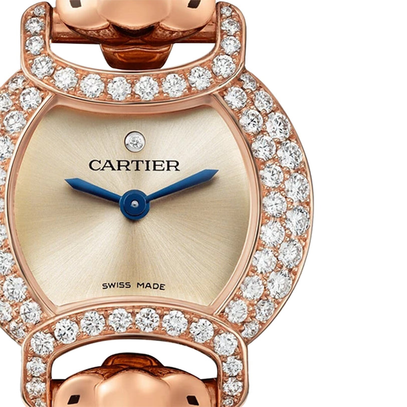 Close-up of the La Panthère de Cartier watch by Cartier, featuring a rose gold face, blue hands, diamond-encrusted bezel, and Swiss Made text at the bottom.