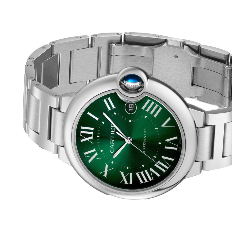 The Ballon Bleu de Cartier watch by Cartier features a green face, Roman numerals, silver case, and a signature blue crown detail.