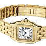 The Cartier Panthère de Cartier Small Model in yellow gold features a square white dial with black Roman numerals, blue hands, a linked bracelet band, and a blue sapphire crown.
